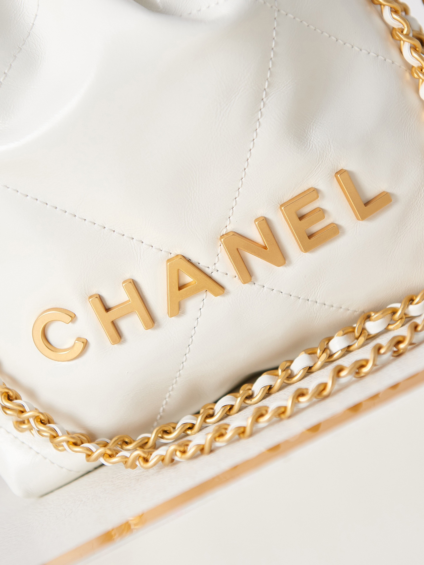 CHANEL 22 MINI HANDBAG Shiny Calfskin & Gold-Tone Metal white 7.8 × 7.4 × 2.3 in