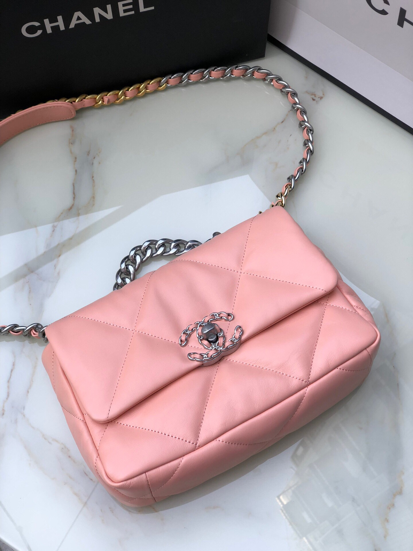 CHANEL 19 HANDBAG Shiny Leather, Gold-Tone, Silver-Tone & Ruthenium-Finish Metal Light Pink 6.2 × 10.1 × 3.5 in