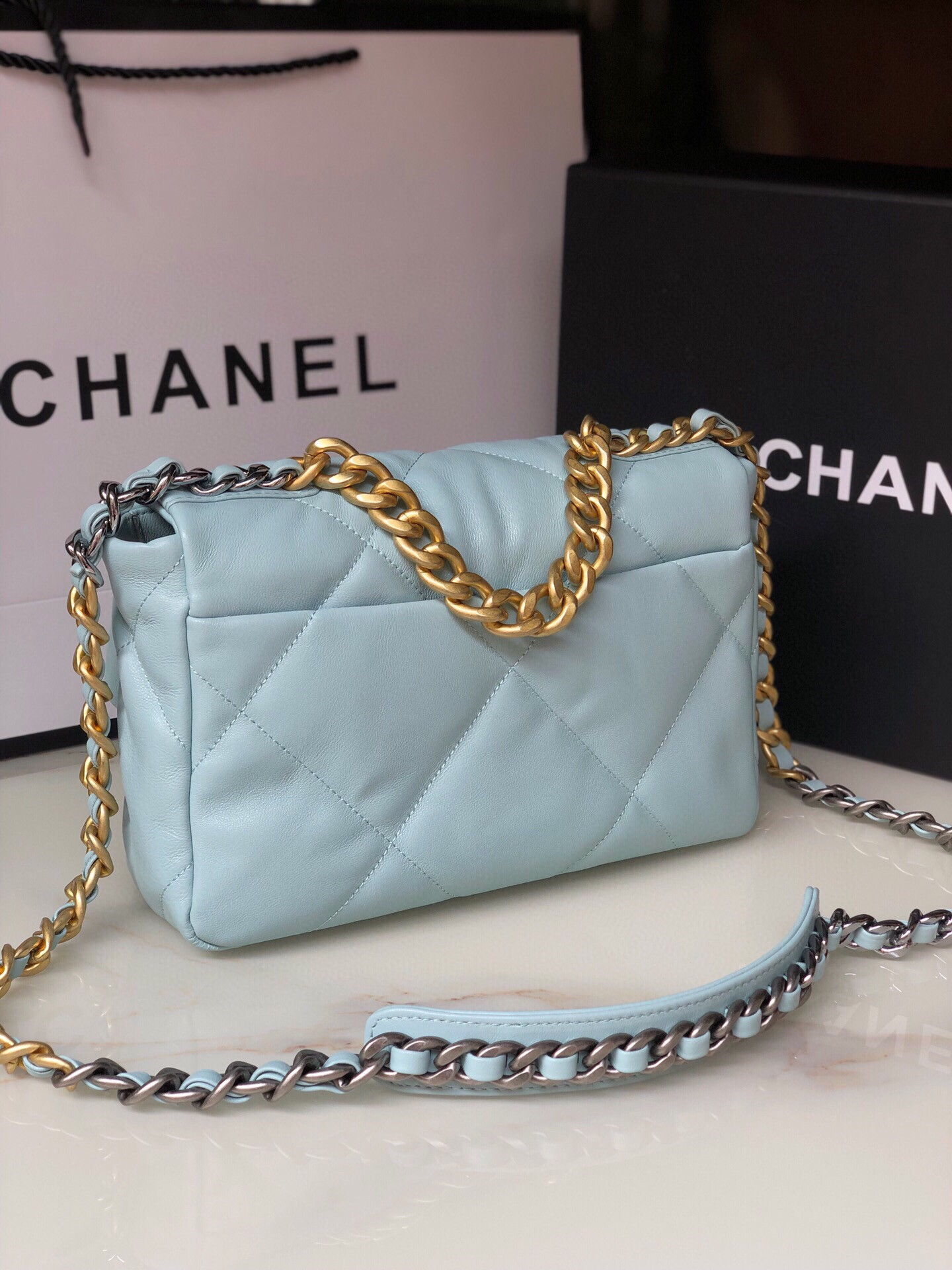 CHANEL 19 HANDBAG Shiny Leather, Gold-Tone, Silver-Tone & Ruthenium-Finish Metal Light Blue 6.2 × 10.1 × 3.5 in